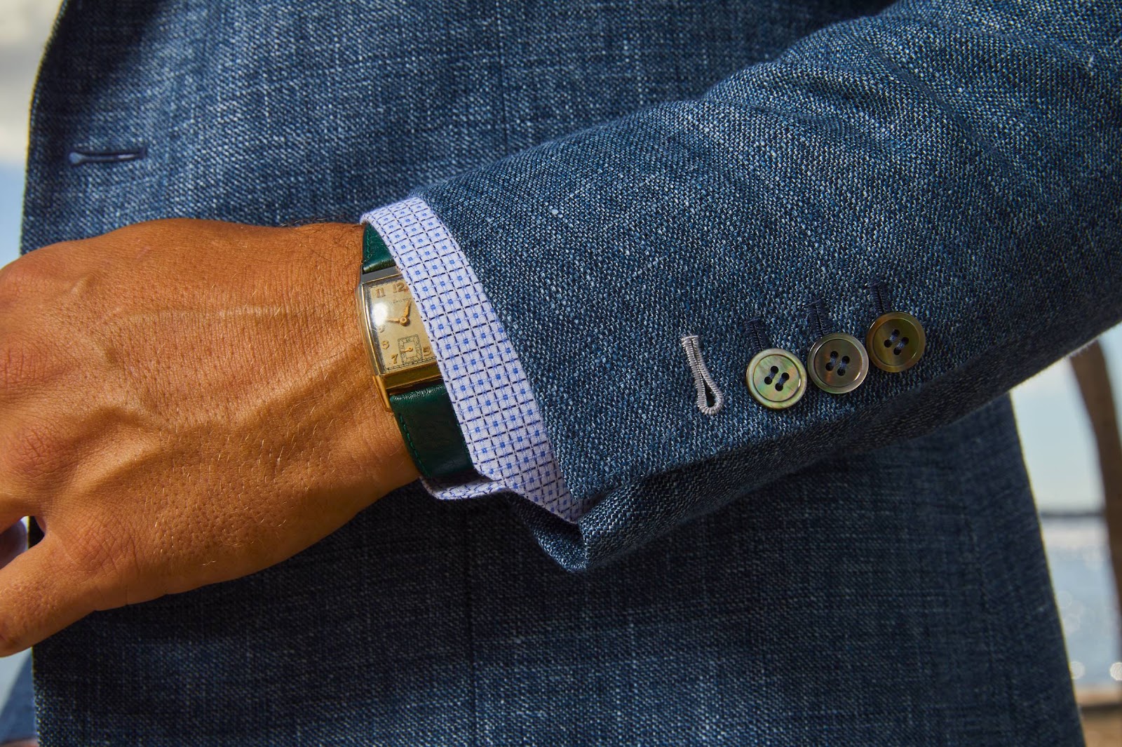 Expertly crafted surgeon cuff detail featuring functional buttonholes on a custom suit sleeve