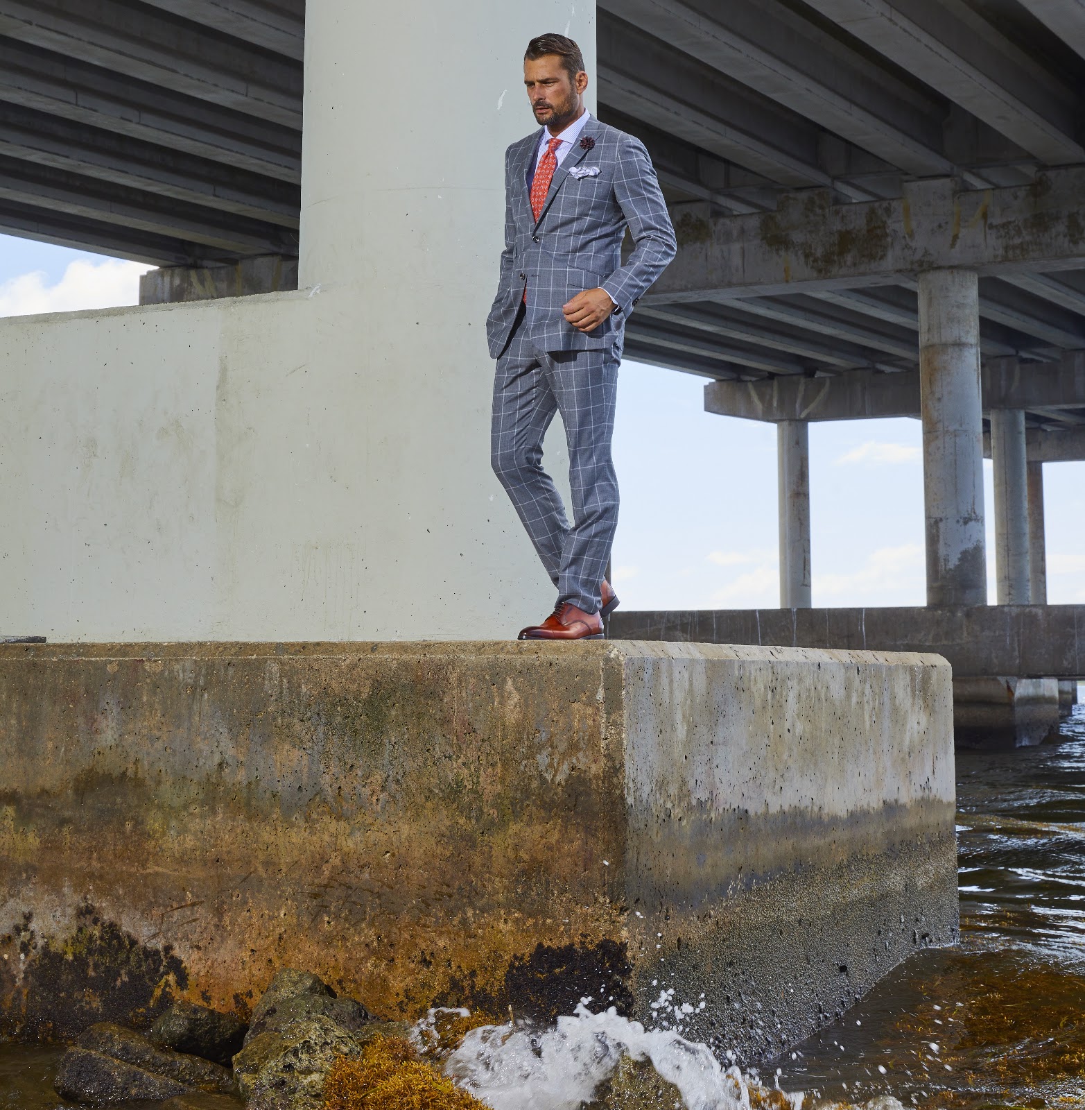 Close up of a windowpane slim fit custom suit highlighting the precision of pattern matching across the seams